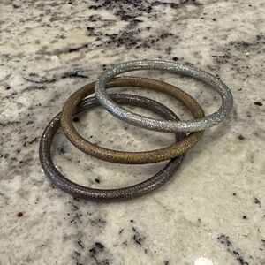 Lia Sophia Glittering Silver and Gold Bracelets